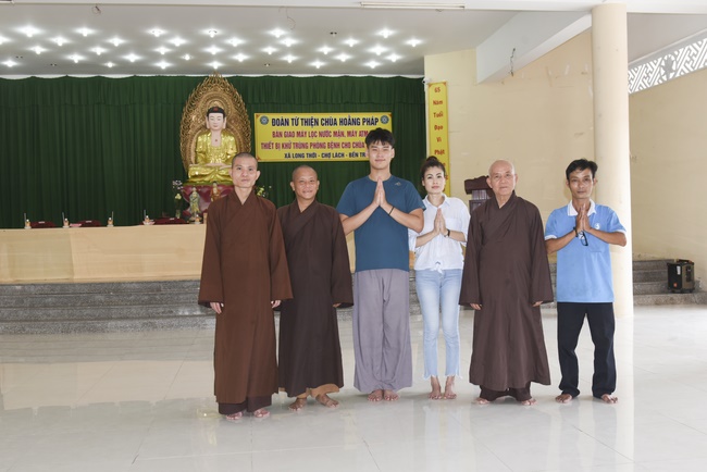 The handover ceremony of saline water purifier and rice ATM machine at Quoc Thoi Pagoda in Ben Tre