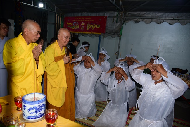 Giving gifts to oncology patients and praying for rebirth in Hoc Mon