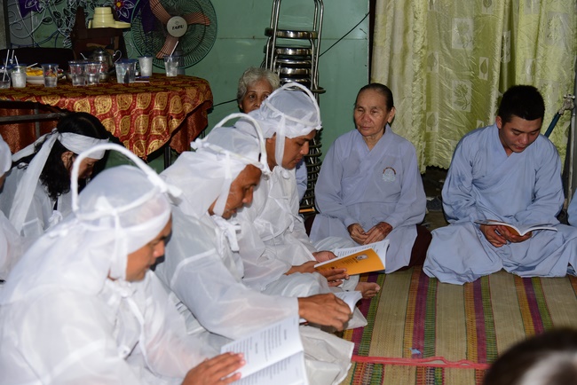 Giving gifts to oncology patients and praying for rebirth in Hoc Mon