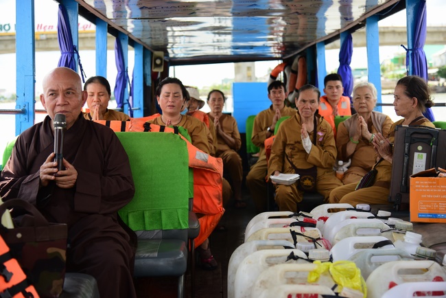 Offering money to build wells at Bao Phap Pagoda, Lam Dong
