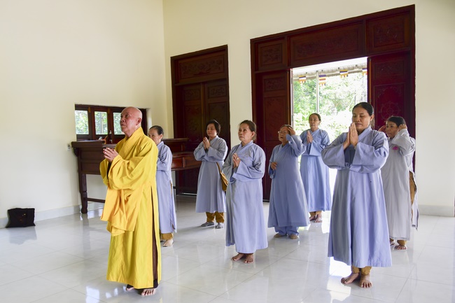 Offering money to build wells at Bao Phap Pagoda, Lam Dong