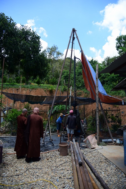 Offering money to build wells at Bao Phap Pagoda, Lam Dong