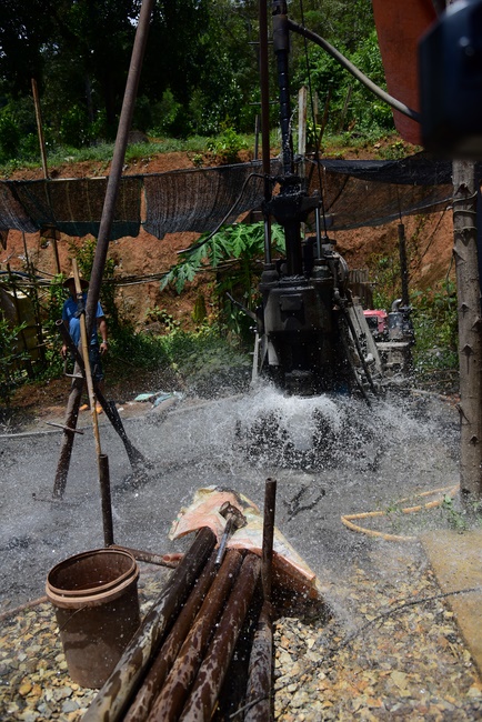 Offering money to build wells at Bao Phap Pagoda, Lam Dong