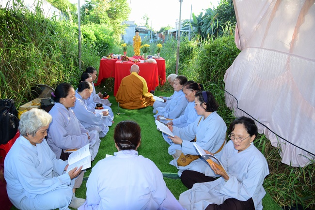 Liberating creatures at Binh My ferry and praying for peacefulness.