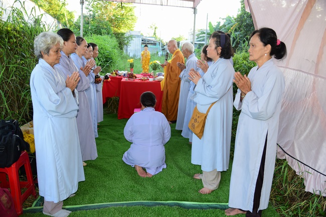 Liberating creatures at Binh My ferry and praying for peacefulness.