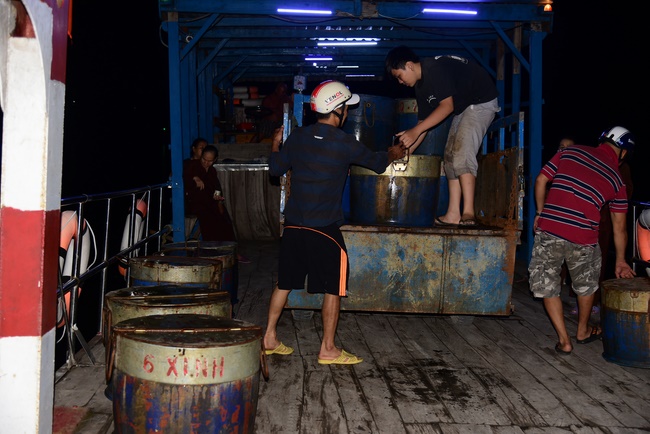 Liberating creatures at Binh My ferry and praying for peacefulness.
