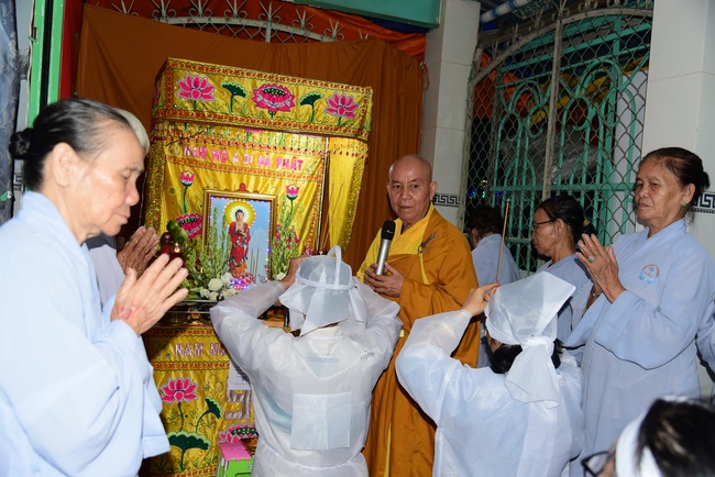 The rite praying for peace and rebirth in District 8, HCMC