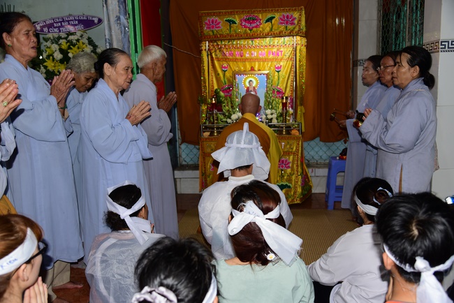 The rite praying for peace and rebirth in District 8, HCMC