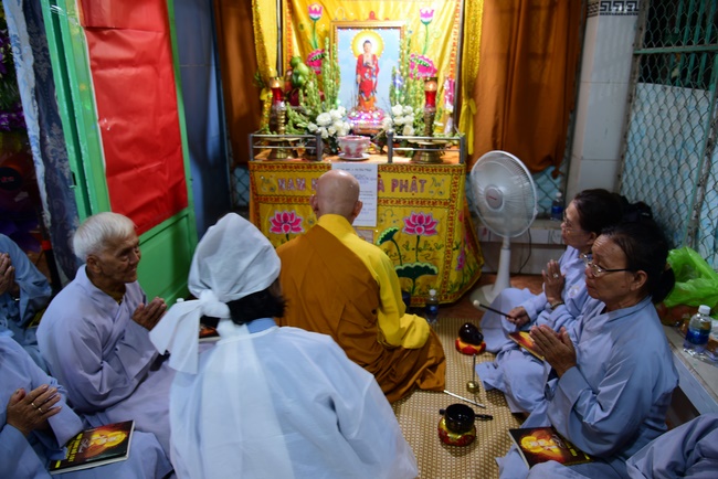 The rite praying for peace and rebirth in District 8, HCMC
