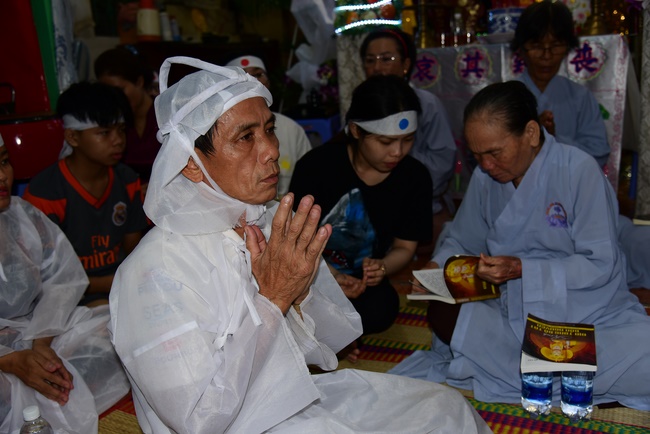 The rite praying for peace and rebirth in District 8, HCMC