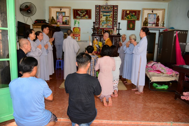 The rite praying for peace and rebirth in District 8, HCMC