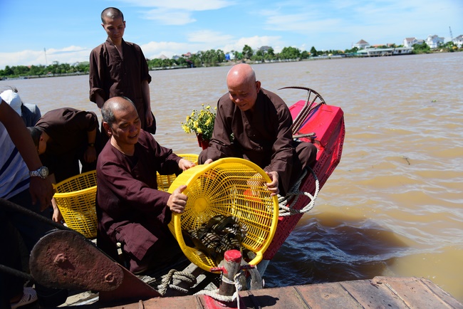 Freeing creatures on Co Bac ferry in Can Tho