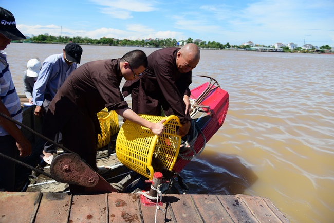 Freeing creatures on Co Bac ferry in Can Tho