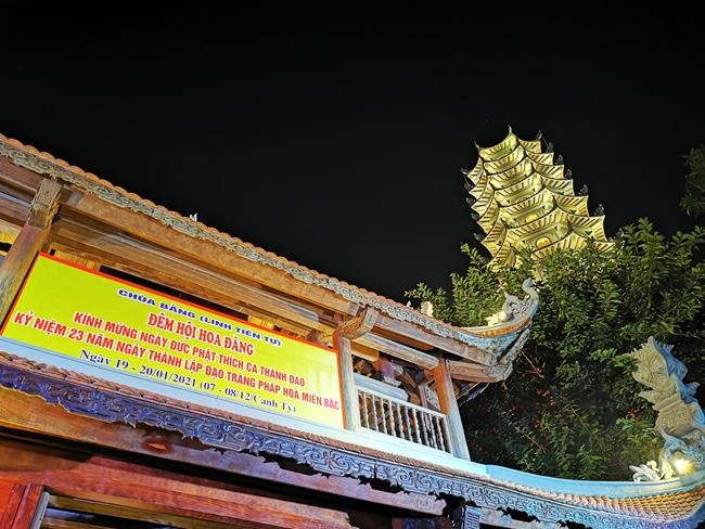 Attending the floral candle light ceremony on the Shakyamuni Buddha's Attainment Day at Bang Pagoda - Ha Noi