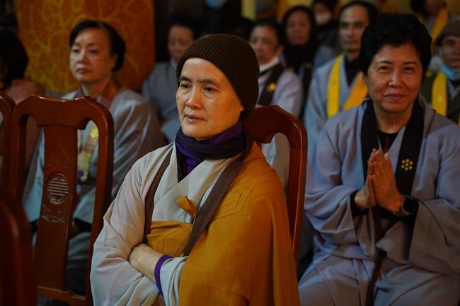 Attending the floral candle light ceremony on the Shakyamuni Buddha's Attainment Day at Bang Pagoda - Ha Noi
