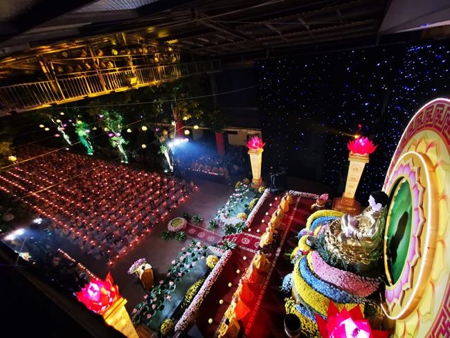 Attending the floral candle light ceremony on the Shakyamuni Buddha's Attainment Day at Bang Pagoda - Ha Noi