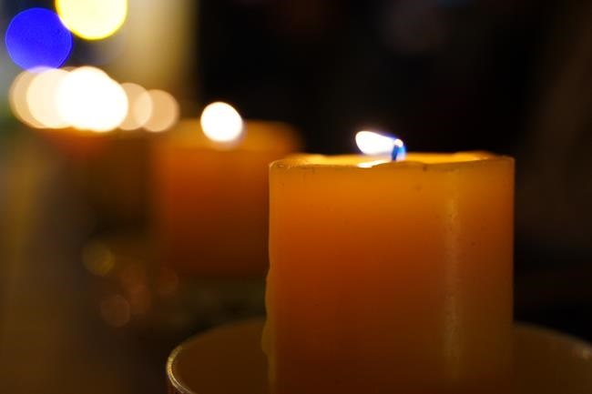 Attending the floral candle light ceremony on the Shakyamuni Buddha's Attainment Day at Bang Pagoda - Ha Noi