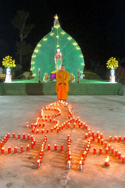 The candle lighting ceremony commemorating Buddha Amitabha at An Son Pagoda - Quang Ngai