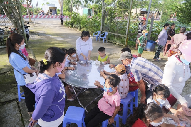 The Full Moon Giving Kids at An Huong Pagoda, An Giang
