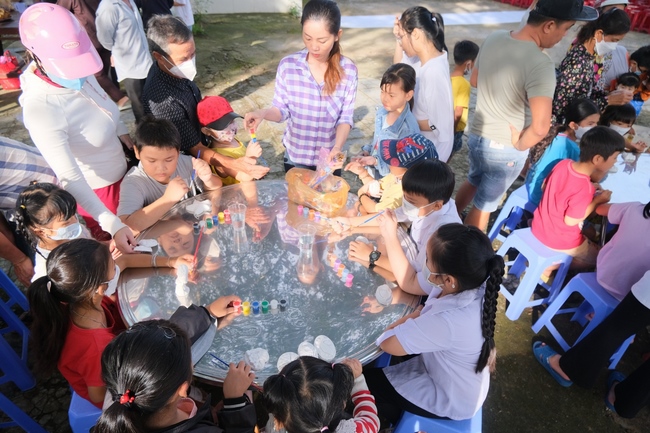 The Full Moon Giving Kids at An Huong Pagoda, An Giang