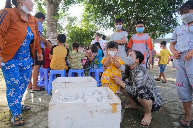 The Full Moon Giving Kids at An Huong Pagoda, An Giang