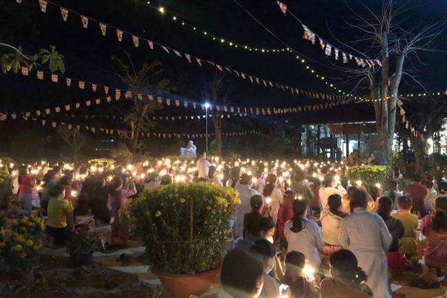 Beginning a sutra in the New Year at Suoi Phap Pagoda, Tay Ninh