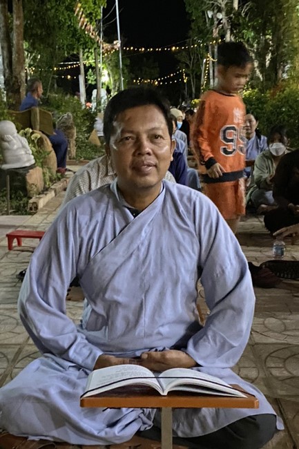 Beginning a sutra in the New Year at Suoi Phap Pagoda, Tay Ninh