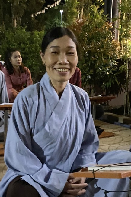 Beginning a sutra in the New Year at Suoi Phap Pagoda, Tay Ninh