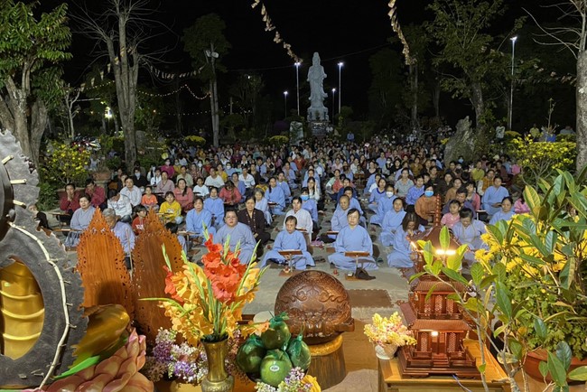 Beginning a sutra in the New Year at Suoi Phap Pagoda, Tay Ninh