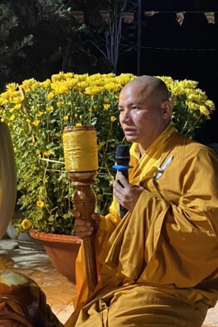 Beginning a sutra in the New Year at Suoi Phap Pagoda, Tay Ninh
