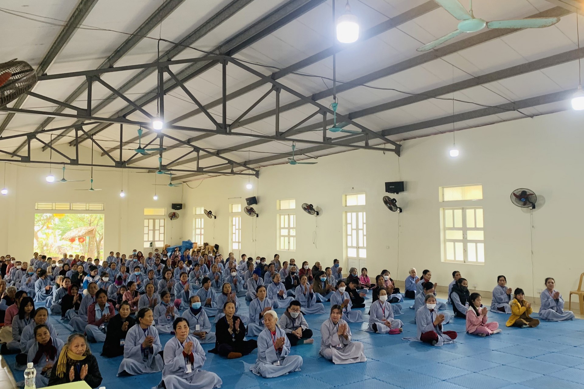 Year End Retreat, a past year closing rite, giving Tet gifts at Dong Cao pagoda