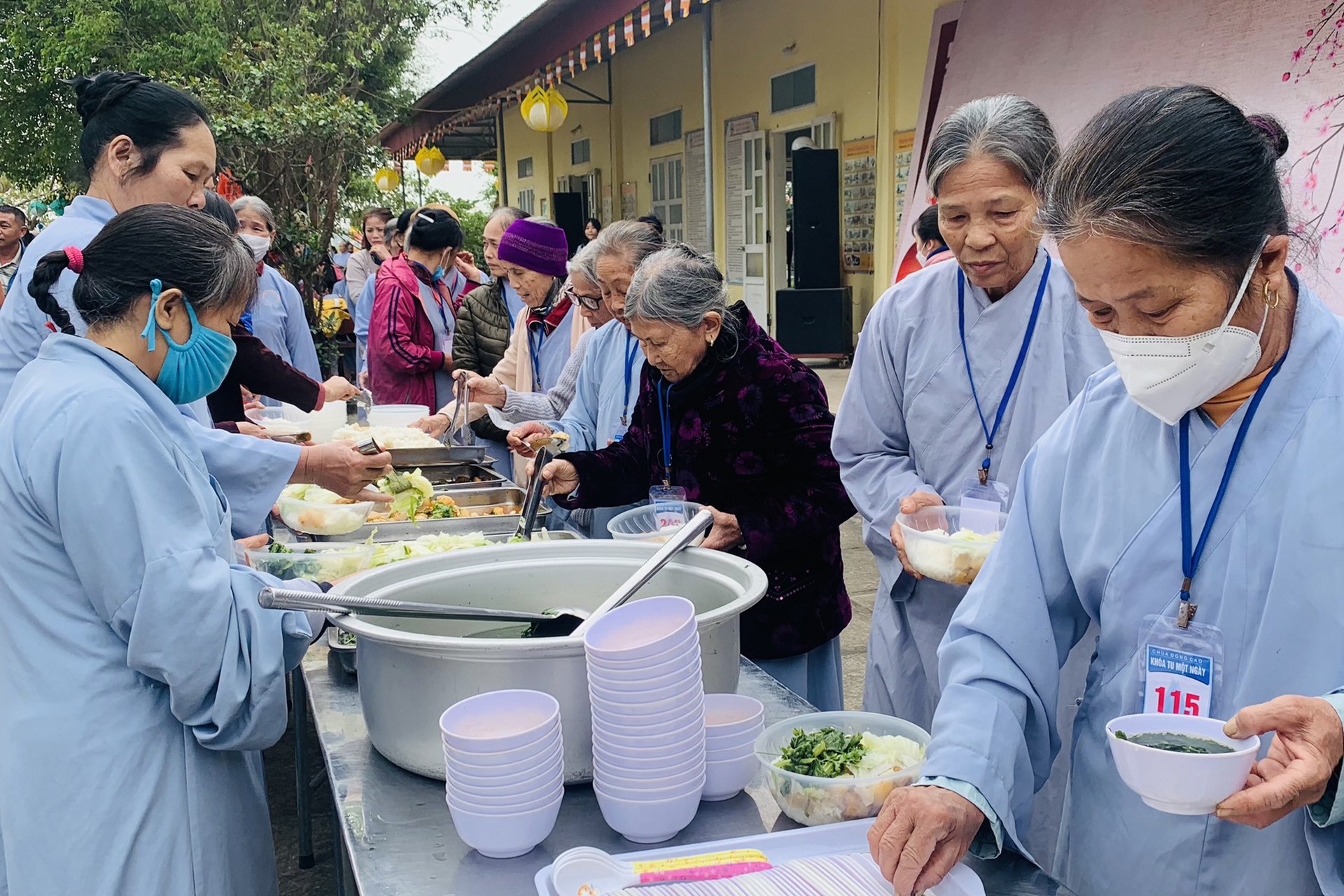 Year End Retreat, a past year closing rite, giving Tet gifts at Dong Cao pagoda