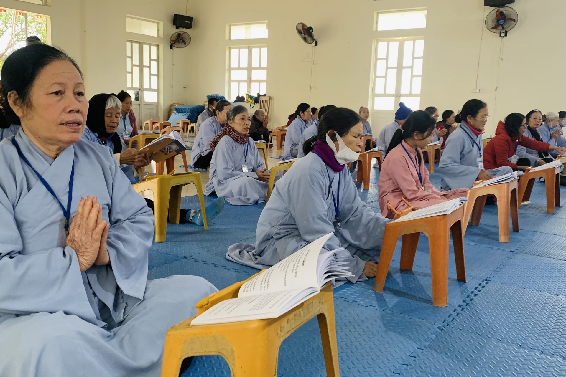 Year End Retreat, a past year closing rite, giving Tet gifts at Dong Cao pagoda