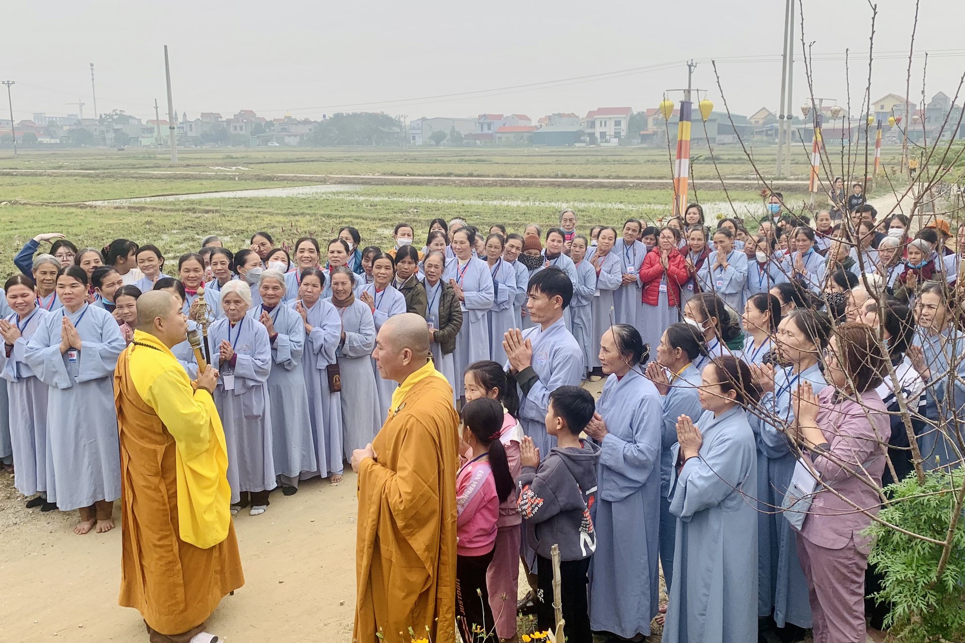 Year End Retreat, a past year closing rite, giving Tet gifts at Dong Cao pagoda