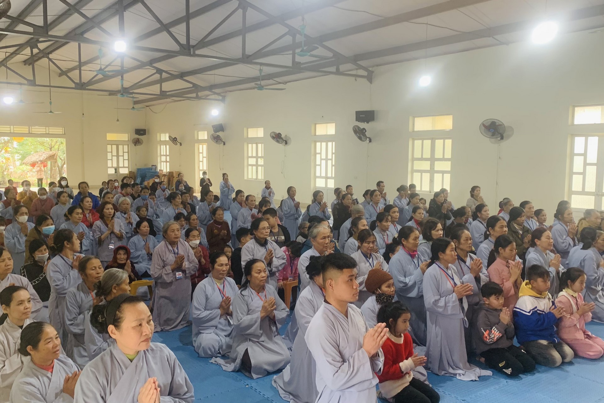 Year End Retreat, a past year closing rite, giving Tet gifts at Dong Cao pagoda