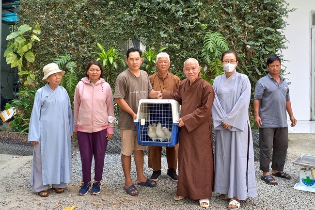 Handing over tortoises and pigeons at Dau Tieng Wildlife Conservation Station, Binh Duong