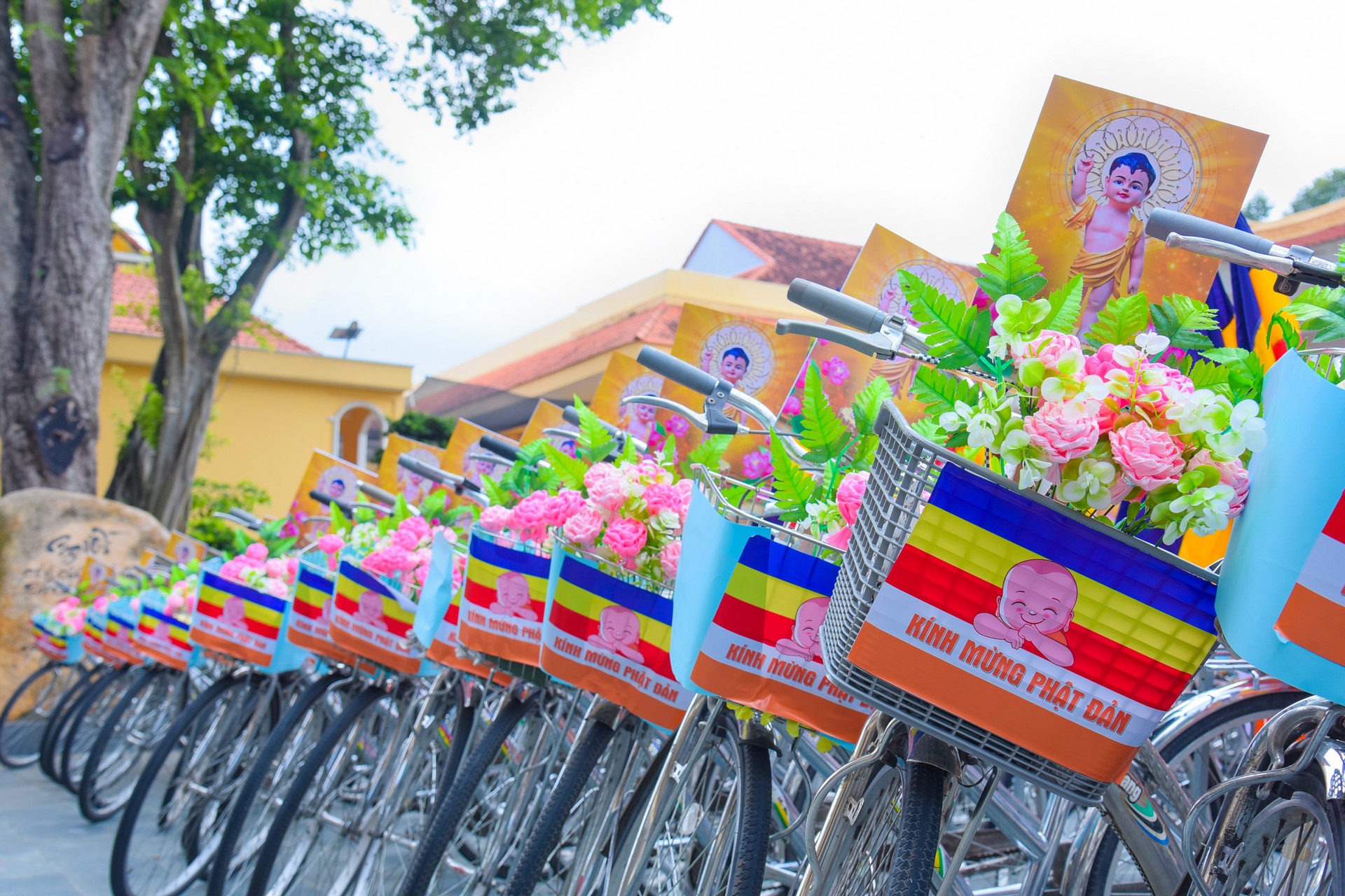 Parade of bicycles decorated with flowers to welcome the Buddha's Birthday (Buddhist Calendar 2567 - Solar Calendar 2023)