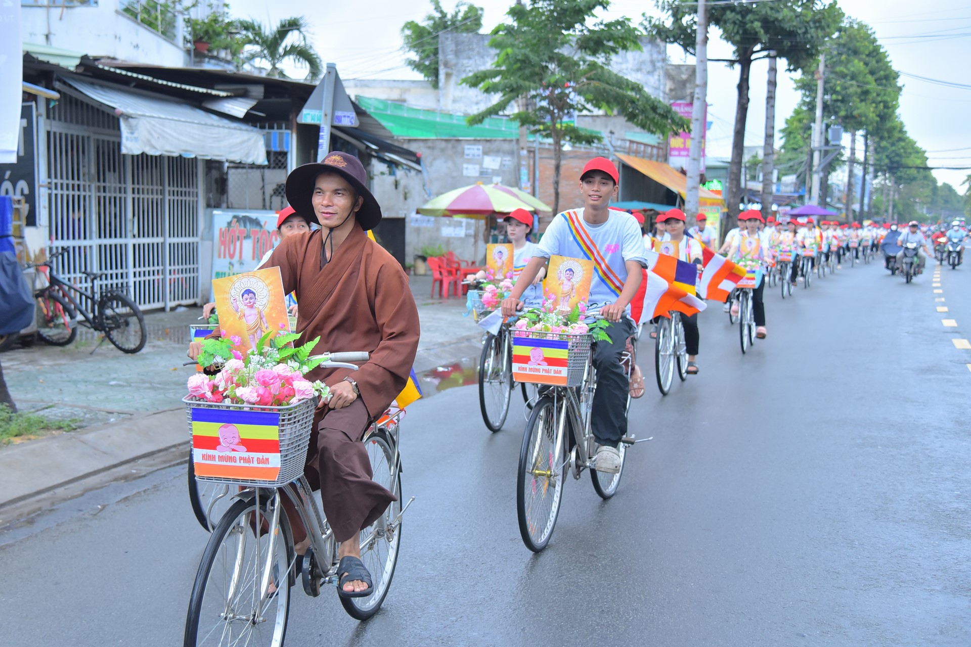 Parade of bicycles decorated with flowers to welcome the Buddha's Birthday (Buddhist Calendar 2567 - Solar Calendar 2023)