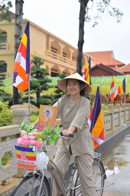 Parade of bicycles decorated with flowers to welcome the Buddha's Birthday (Buddhist Calendar 2567 - Solar Calendar 2023)