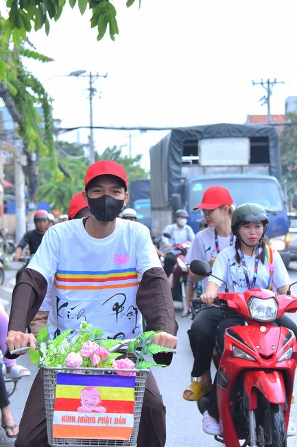 Parade of bicycles decorated with flowers to welcome the Buddha's Birthday (Buddhist Calendar 2567 - Solar Calendar 2023)