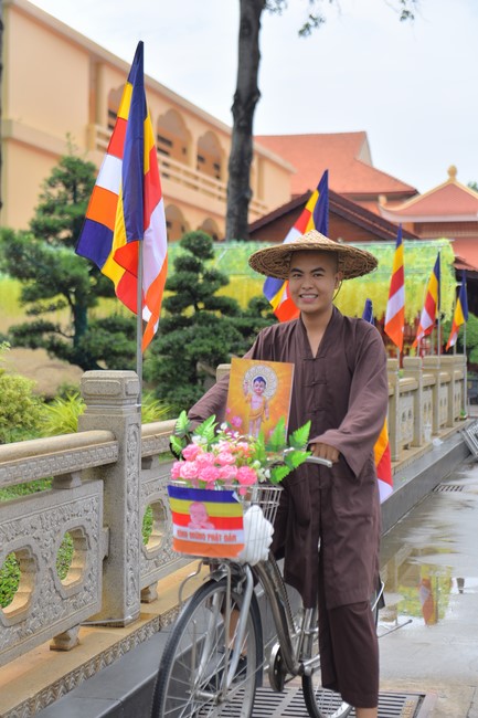 Parade of bicycles decorated with flowers to welcome the Buddha's Birthday (Buddhist Calendar 2567 - Solar Calendar 2023)