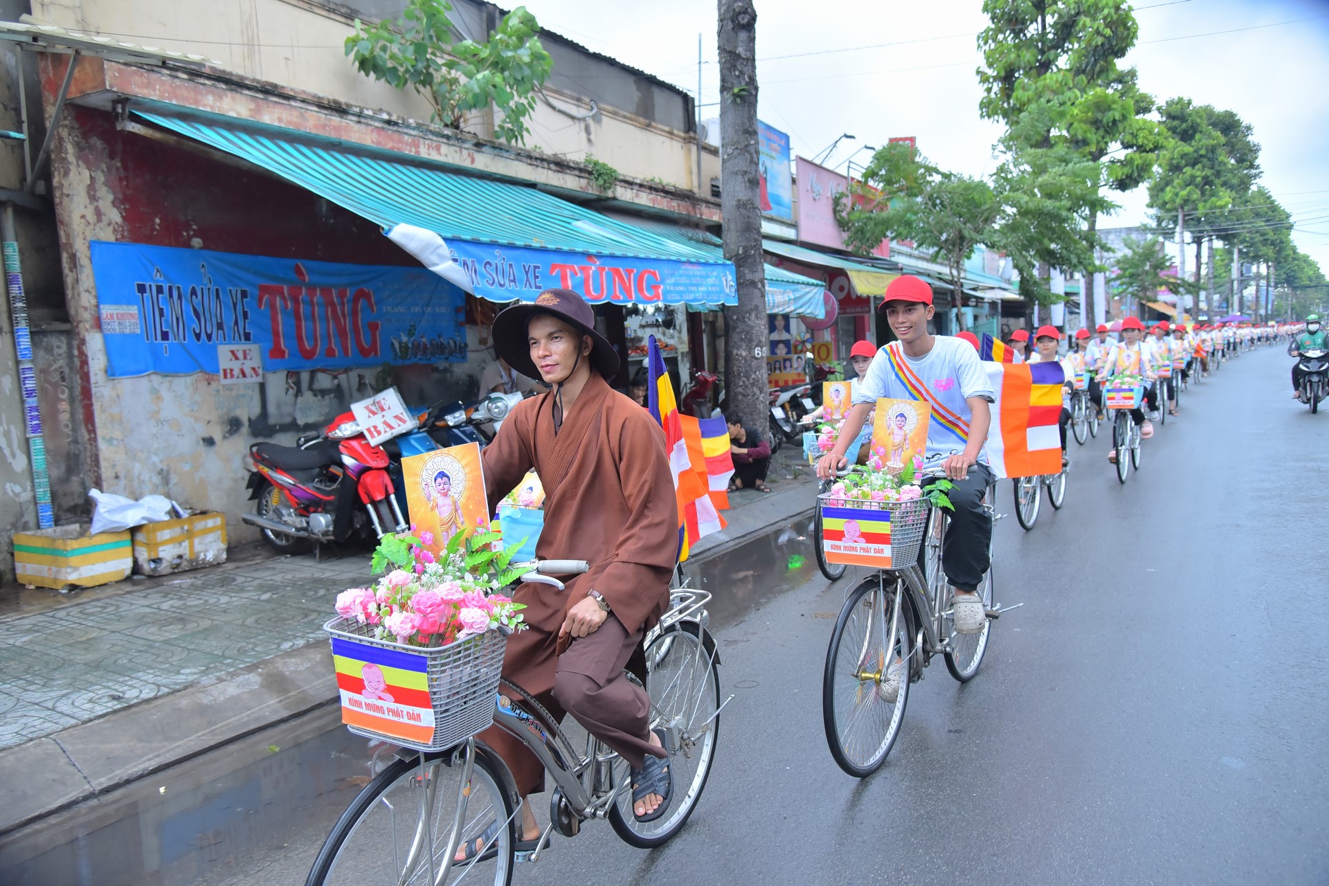 Parade of bicycles decorated with flowers to welcome the Buddha's Birthday (Buddhist Calendar 2567 - Solar Calendar 2023)