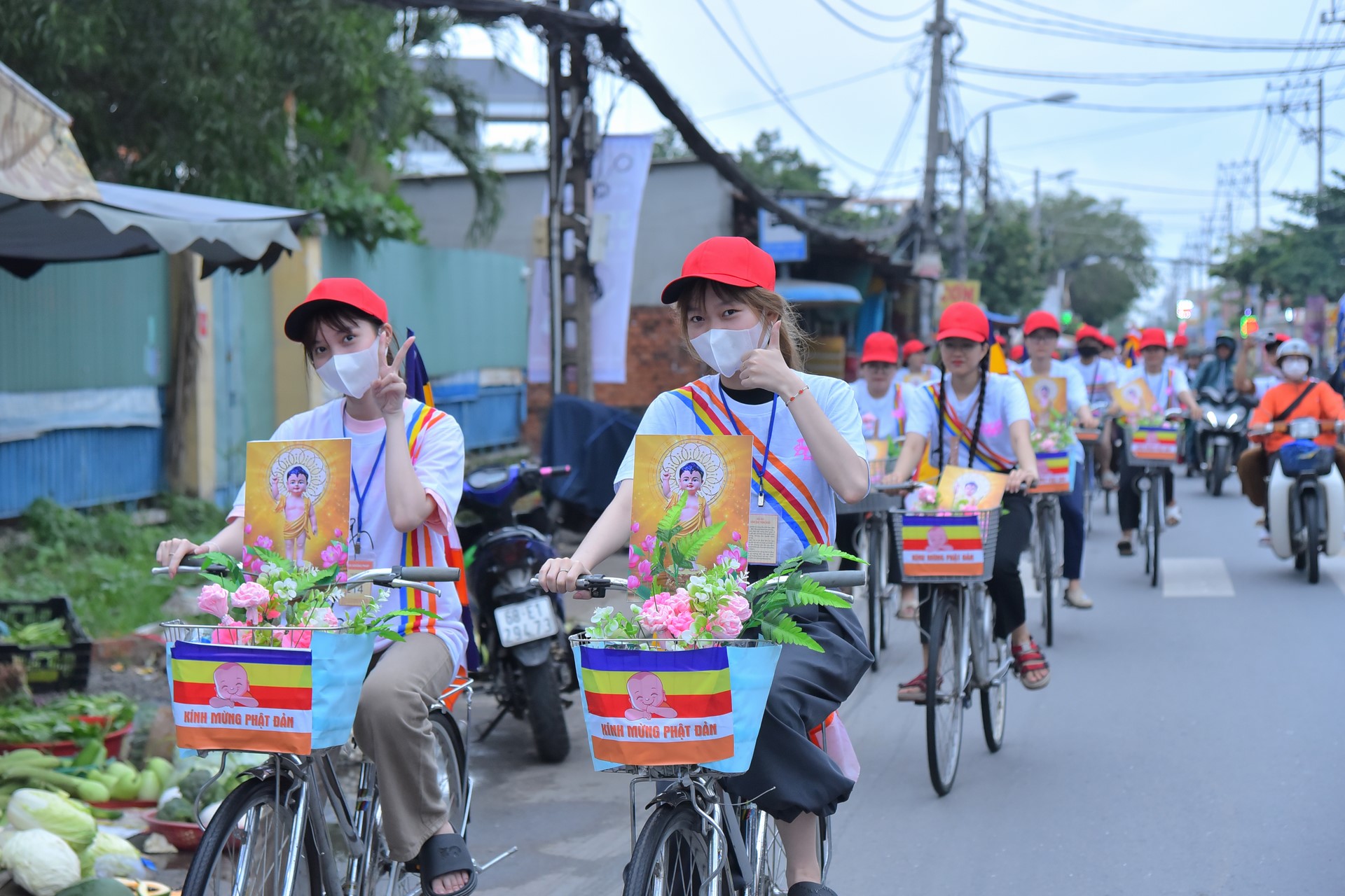 Parade of bicycles decorated with flowers to welcome the Buddha's Birthday (Buddhist Calendar 2567 - Solar Calendar 2023)