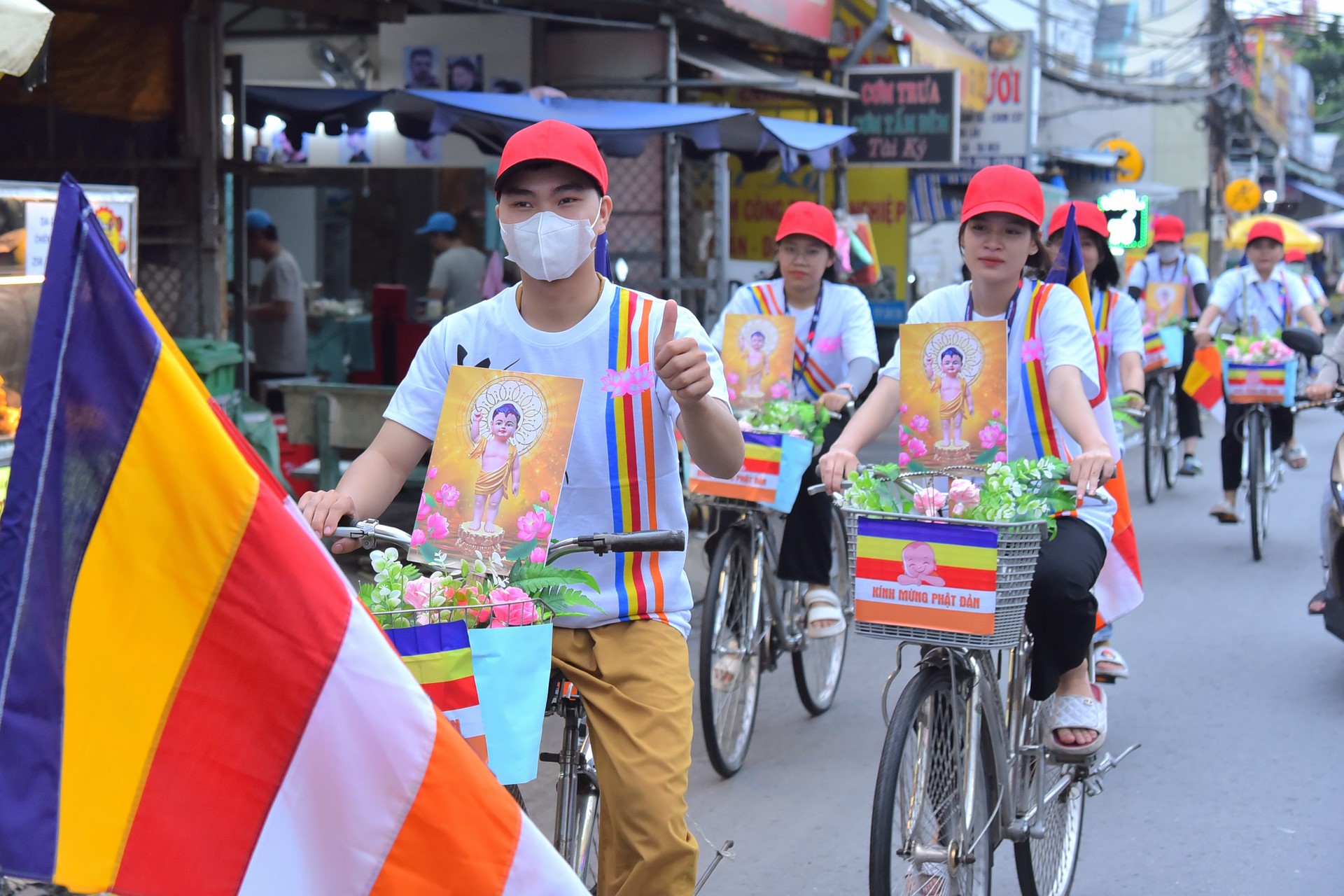 Parade of bicycles decorated with flowers to welcome the Buddha's Birthday (Buddhist Calendar 2567 - Solar Calendar 2023)