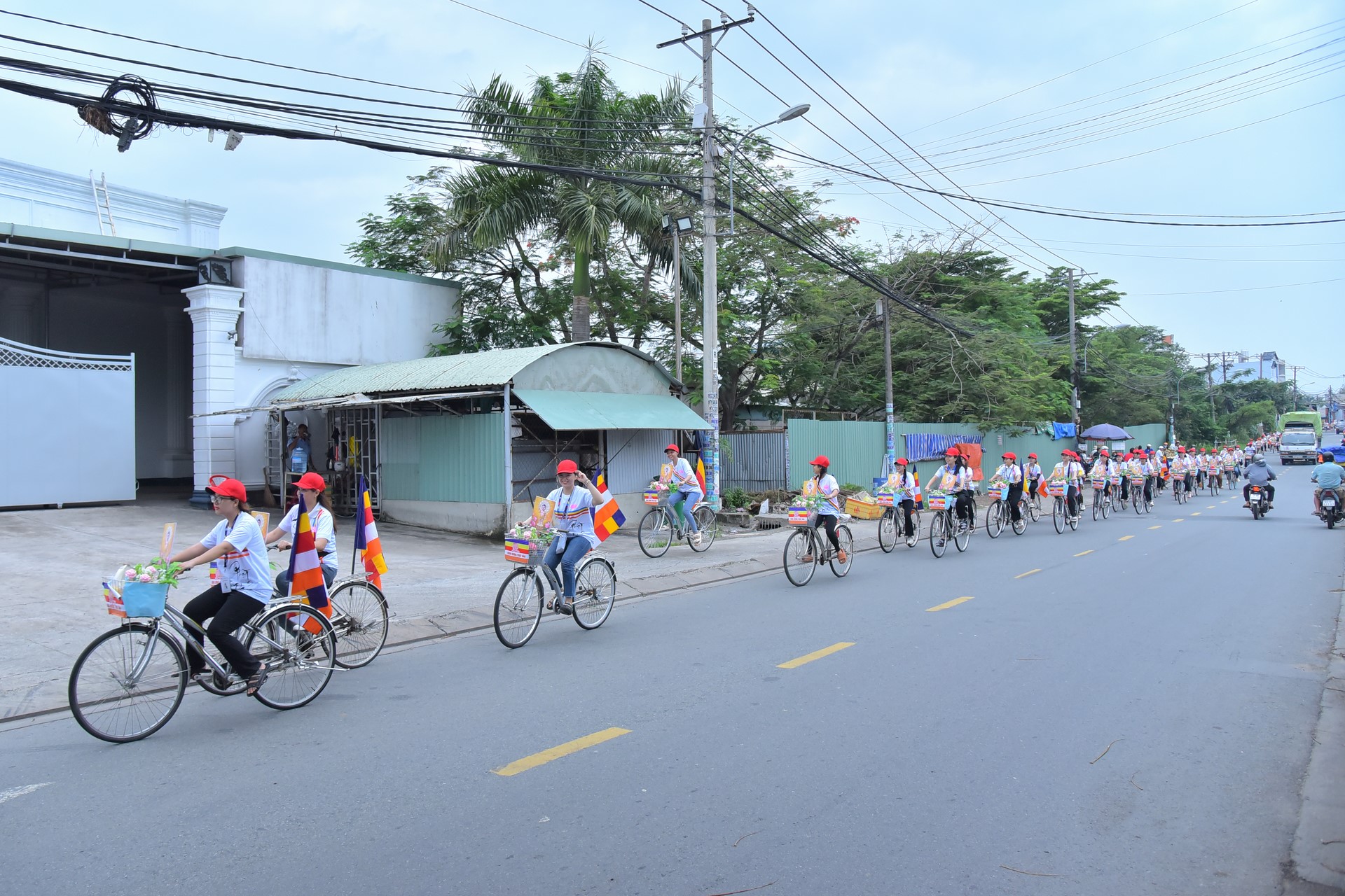 Parade of bicycles decorated with flowers to welcome the Buddha's Birthday (Buddhist Calendar 2567 - Solar Calendar 2023)