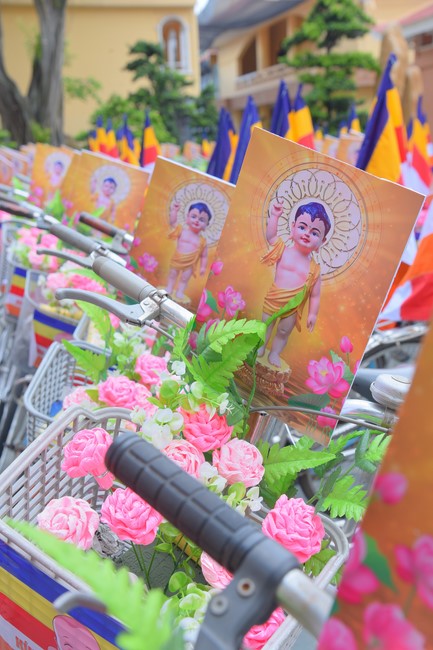 Parade of bicycles decorated with flowers to welcome the Buddha's Birthday (Buddhist Calendar 2567 - Solar Calendar 2023)