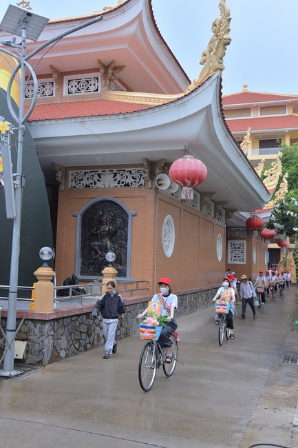 Parade of bicycles decorated with flowers to welcome the Buddha's Birthday (Buddhist Calendar 2567 - Solar Calendar 2023)
