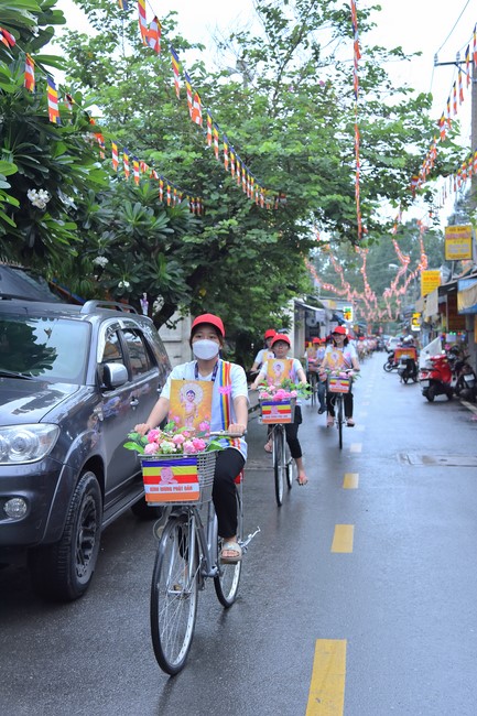 Parade of bicycles decorated with flowers to welcome the Buddha's Birthday (Buddhist Calendar 2567 - Solar Calendar 2023)