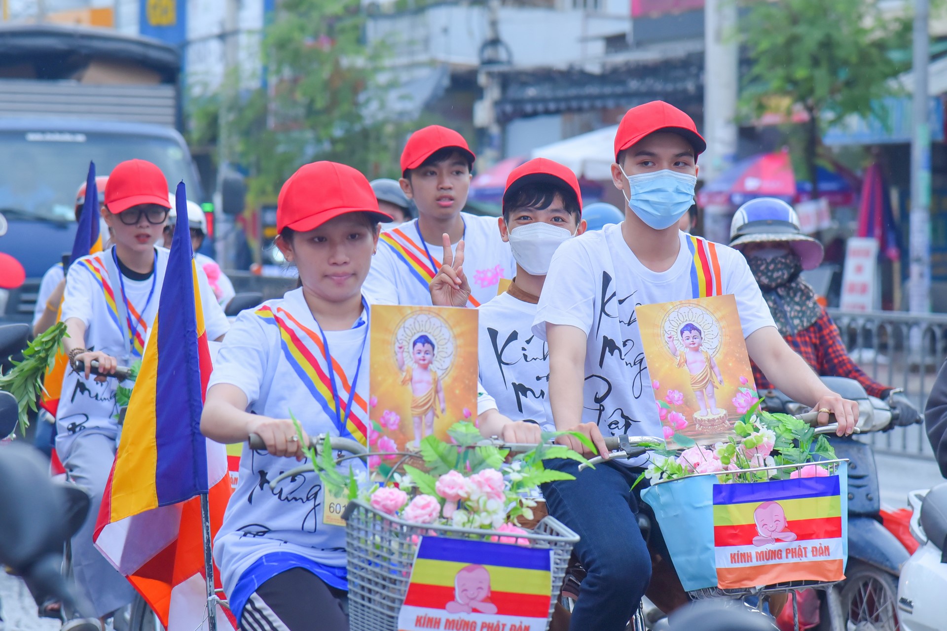 Parade of bicycles decorated with flowers to welcome the Buddha's Birthday (Buddhist Calendar 2567 - Solar Calendar 2023)