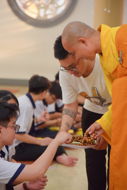 Nhan Van School students praying for University Examination 2023